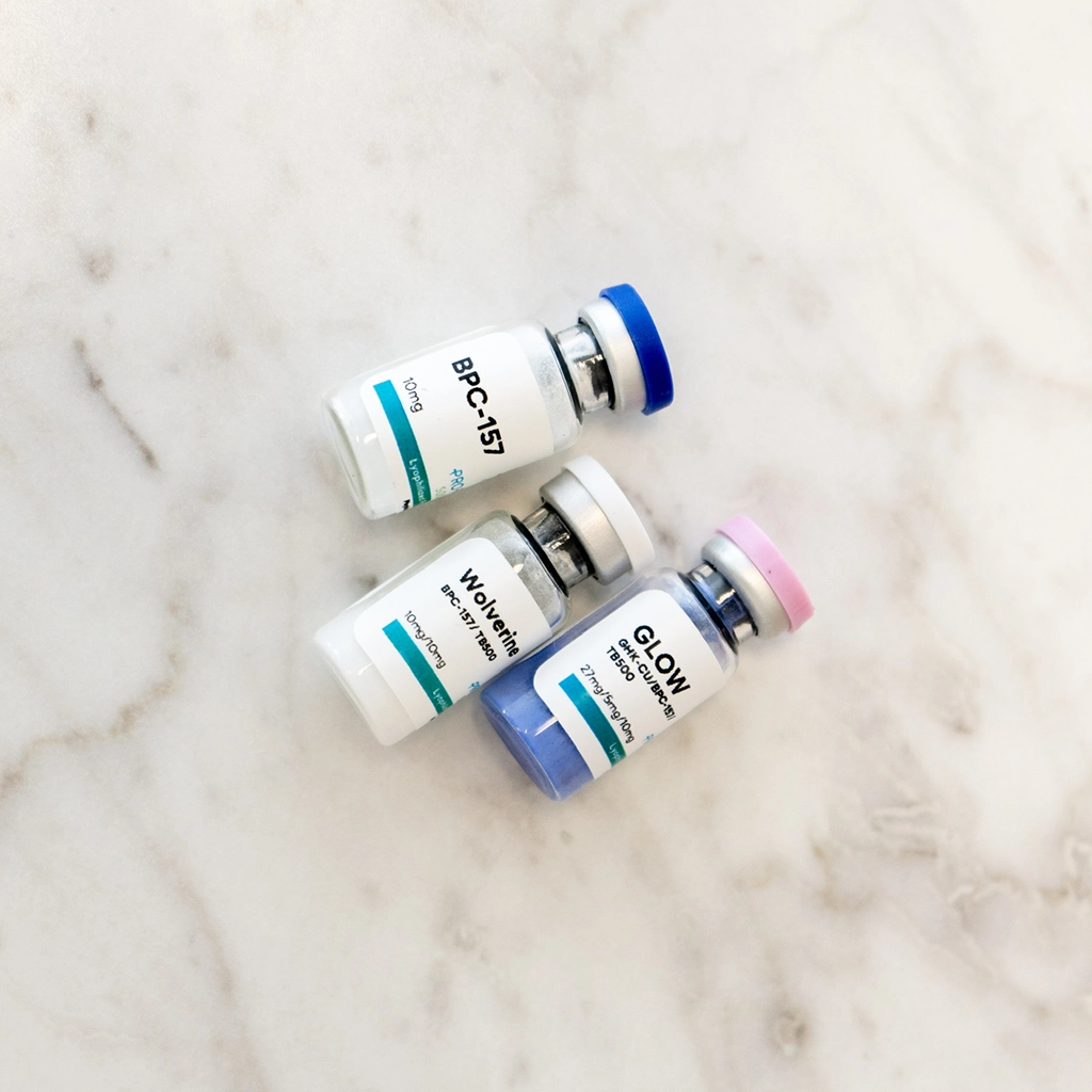 about face medical aesthetics closeup of peptide vials laying on counter top