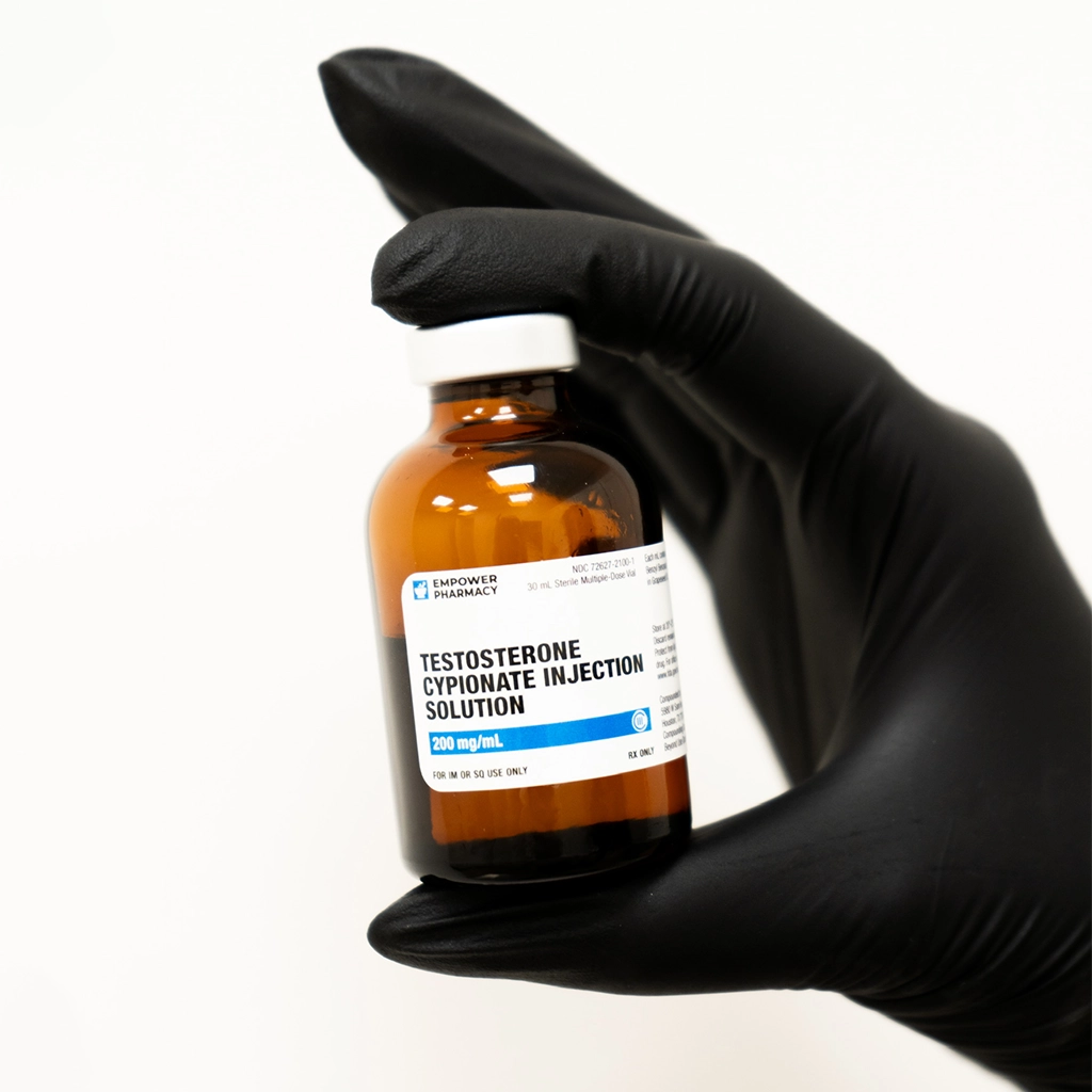 about face medical aesthetics hand holding injection vial